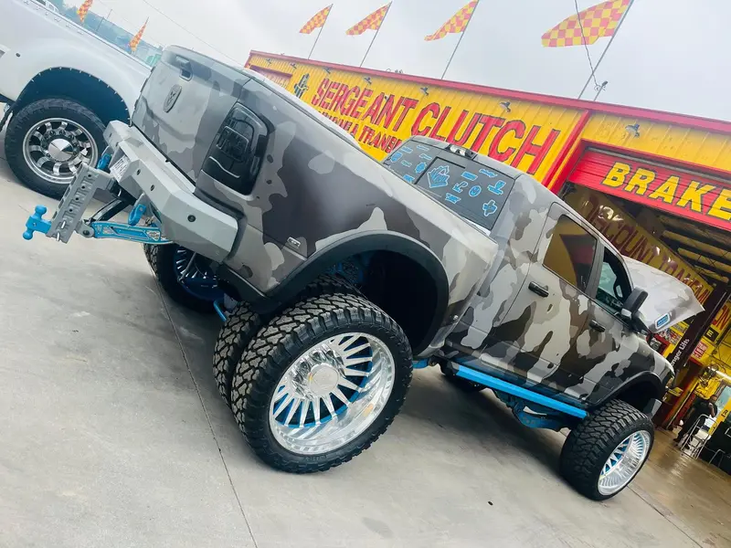 Lifted 4x4 truck in for transfer case service