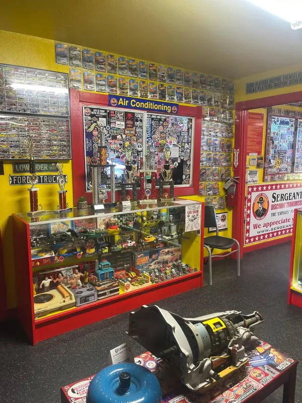 Collectibles and display cases in the Sergeant Clutch lobby