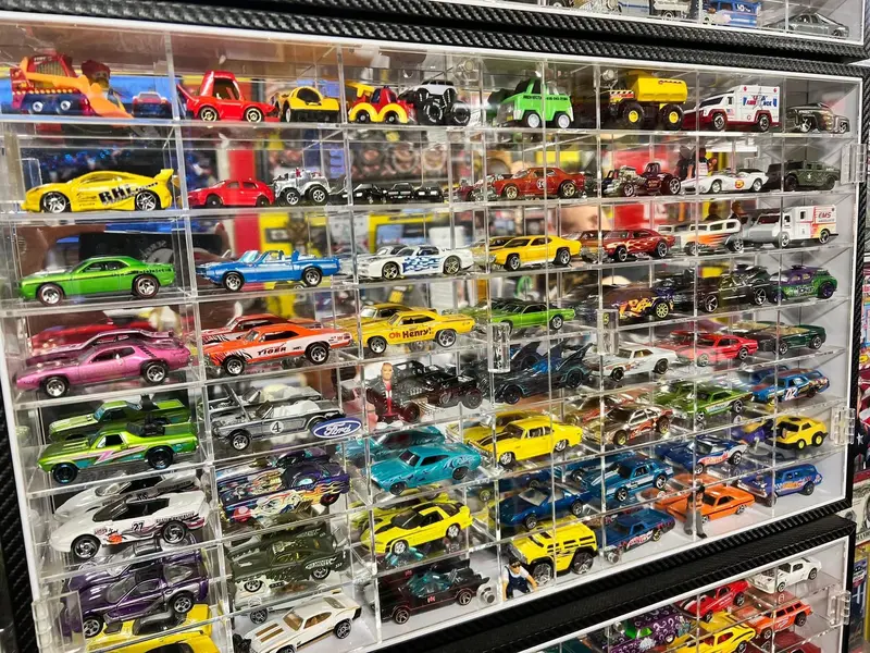 Die-cast car collection in the customer lounge