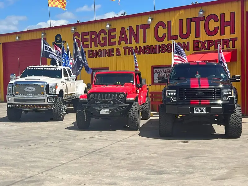 Lifted trucks outside the Sergeant Clutch shop
